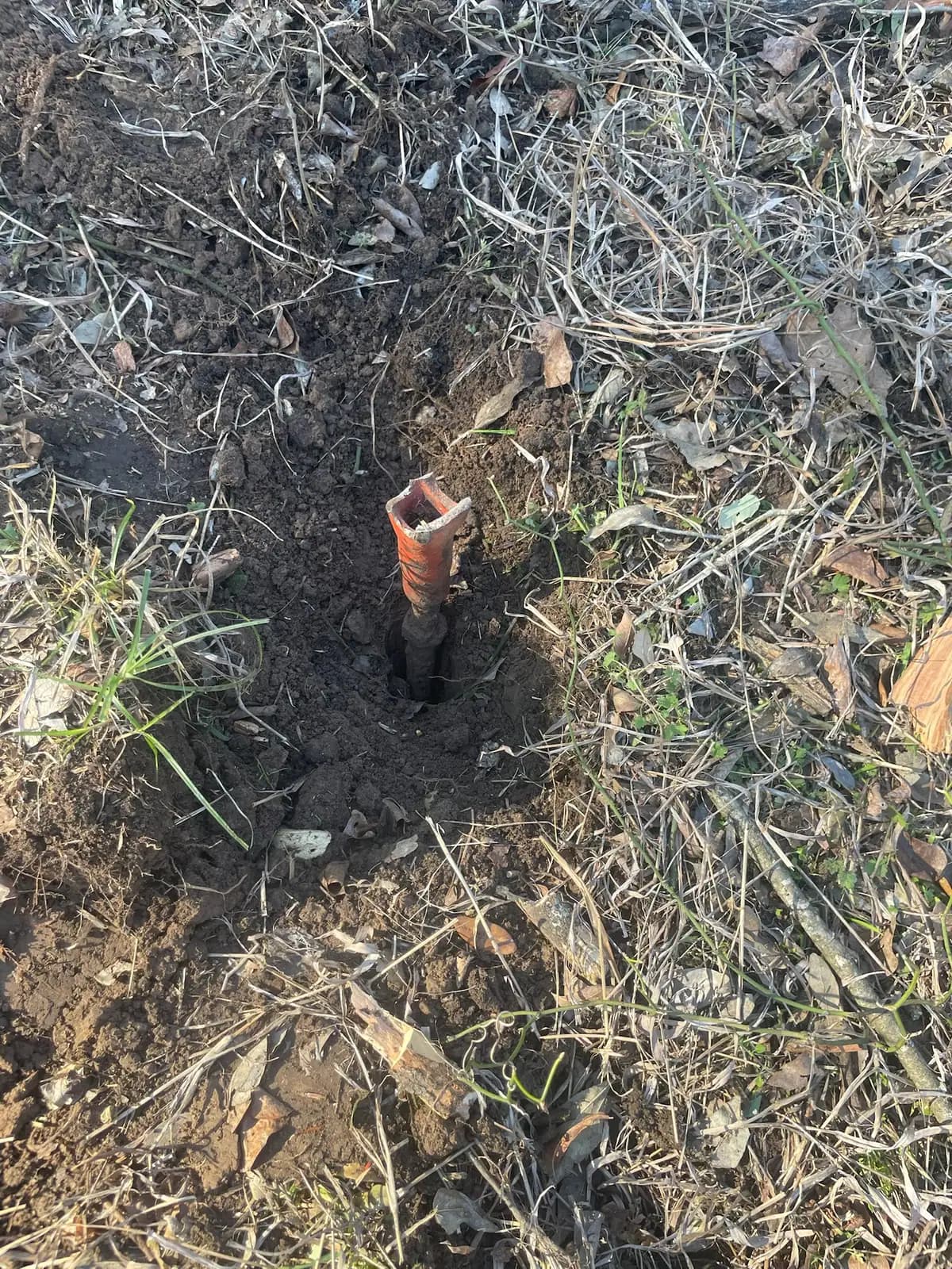 Close-up of the mulch layer left on the ground after forestry mulching in Granbury, TX